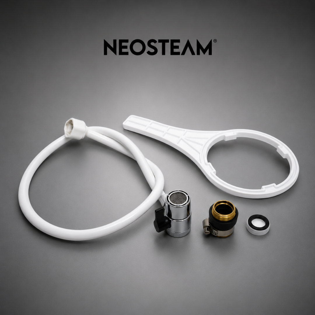 33 1 - NeoSteam Neosteam logo with a white hose and assorted replacement parts on a gray surface.