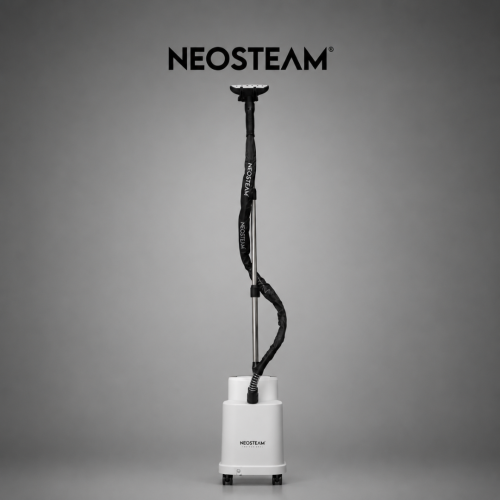 Portable garment steamer on a wheeled base with a tall vertical pole and hose, branded Neosteam, used to remove wrinkles from clothes