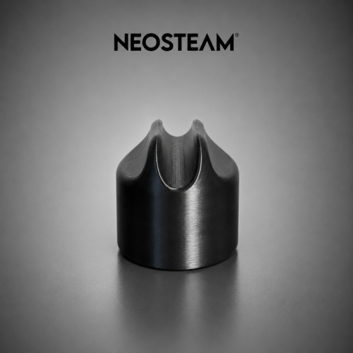 95 - NeoSteam Close-up of a black metal crown-shaped nozzle with a U-shaped notch on a gray backdrop, NEOSTEAM logo above.