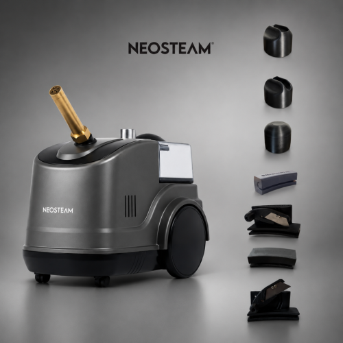 Steam cleaning machine (Neosteam) with brass nozzle and a set of interchangeable attachments displayed to the right side on a gray backdrop.
