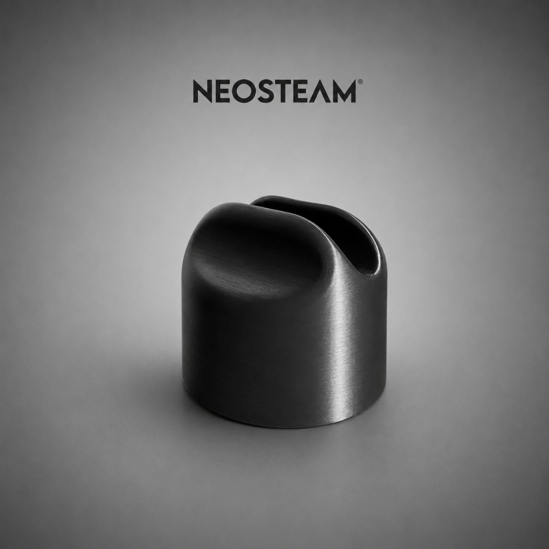 37 - NeoSteam Neosteam logo above a matte black metal component with a rounded, scooped top on a gray gradient background
