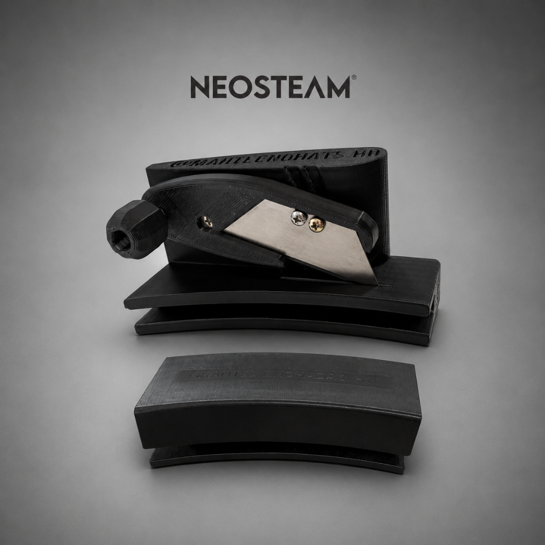 35 - NeoSteam Neosteam brand image showing a black metal tool with a curved lever and a silver blade on a gray studio backdrop.