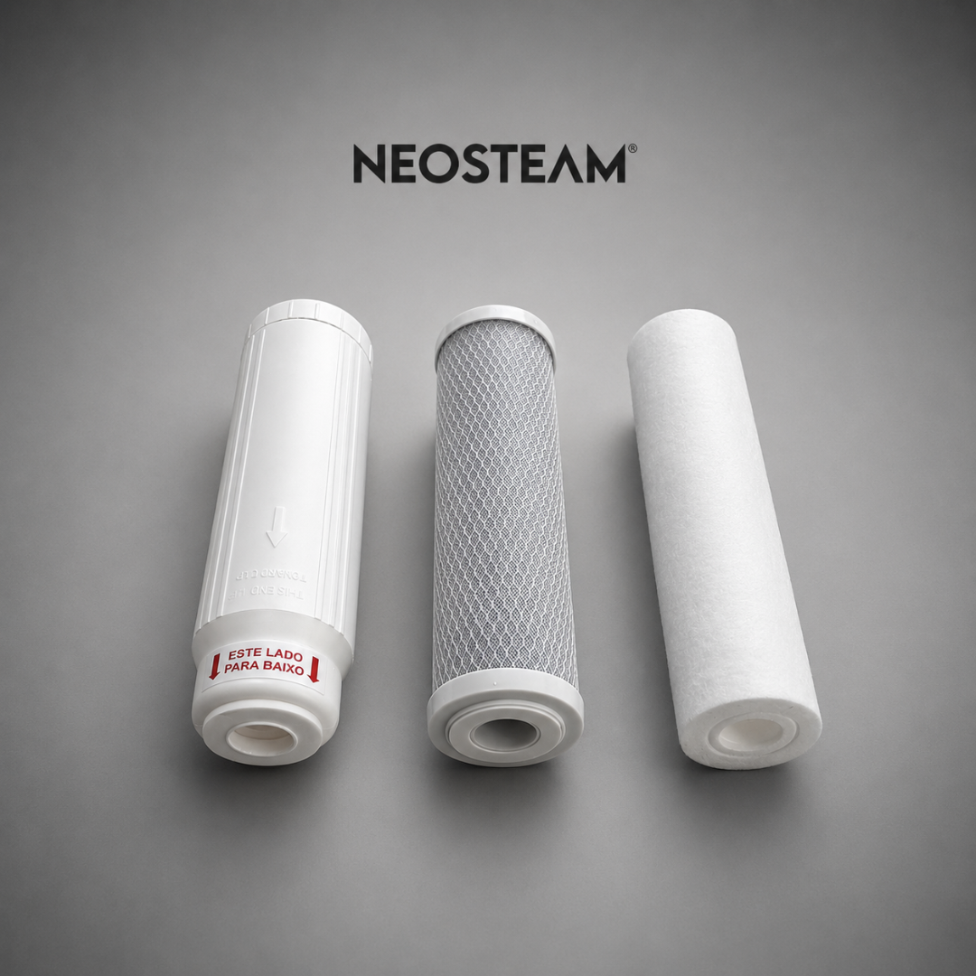 43 - NeoSteam Three white cylindrical water filter cartridges laid horizontally on a gray surface with the NEOSTEAM logo above them, illustrating replacement filters.