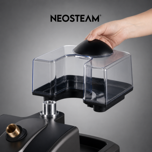 44 - NeoSteam Hand presses a black dome on a transparent reservoir attached to a Neosteam device, in a close-up shot.