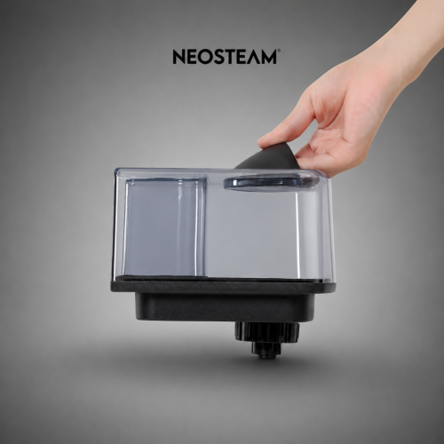 Hand lifting a clear plastic water tank with a black base from a NEOSTEAM appliance.