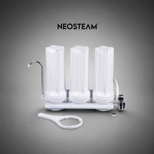 39 - NeoSteam Triple‑stage white water filtration system with a chrome faucet, mounted on a base (Neosteam brand).