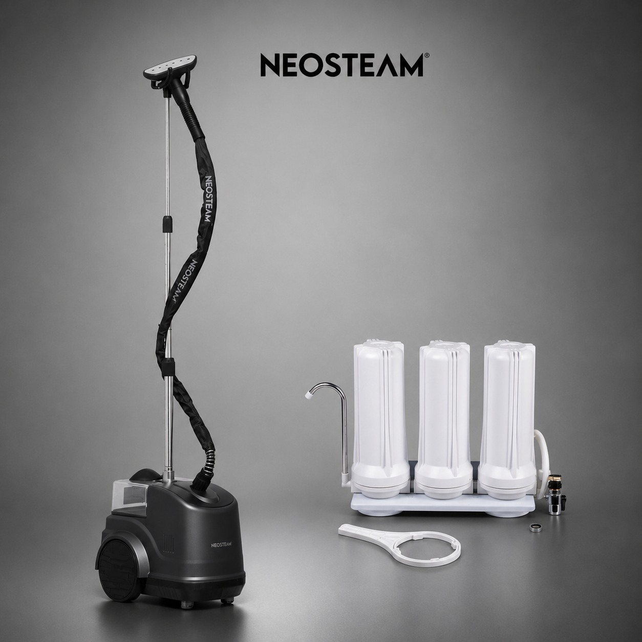 roupasempe_filtro - NeoSteam Neosteam professional garment steamer with a tall vertical wand, base unit, and four white water tanks on a rack.