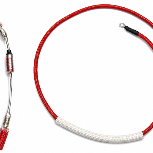99f39e68-2ef5-420c-a3fd-7525cbf0b97b - NeoSteam Red braided electrical cable with an inline fuse, showing ring terminal on one end and crimped connectors on the other, arranged in a loose loop.