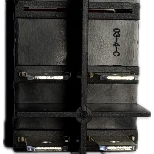 WhatsApp Image 2026-08-19 at 112932 - NeoSteam Two-pole electrical circuit breaker with black housing and a central divider, side marked 03-4-C.